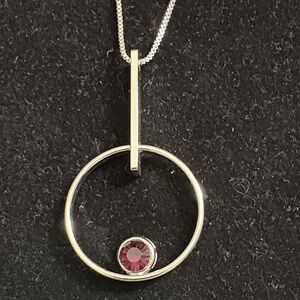 Elegant Silver Pendant Necklace with Purple Gemstone
